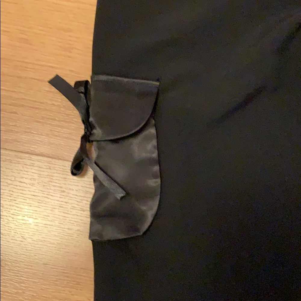 Black crop pants! With satin bows! And pockets